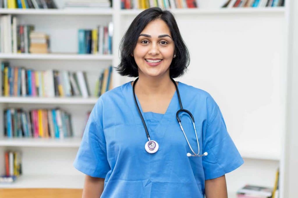 Latina Nurse in Medical Office